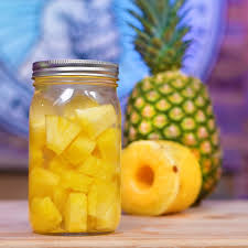 Pineapple soaked in sugar and cut into slices